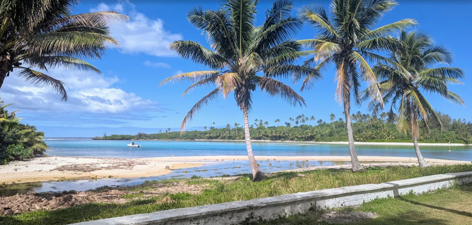 White sand beach and clear lagoon water on Rarotonga
