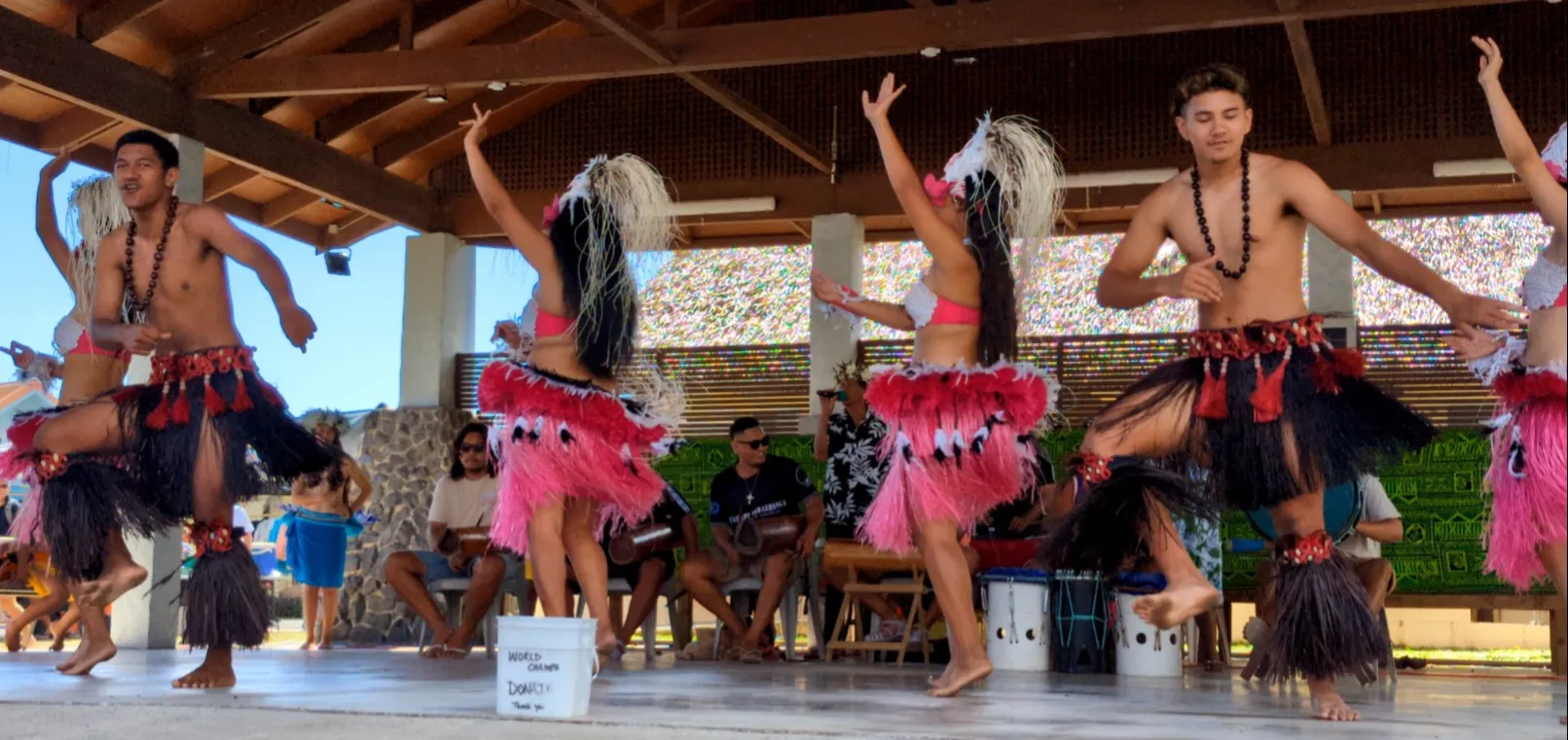 Traditional Polynesian dancers performing at the Rarotonga Saturday market