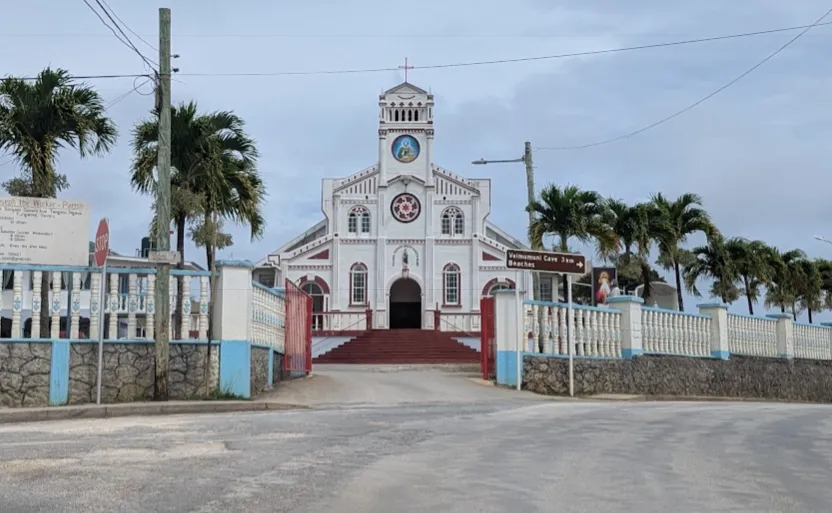 Tongan churchgoers in ta'ovalas and keikeis at Sunday service in Neiafu