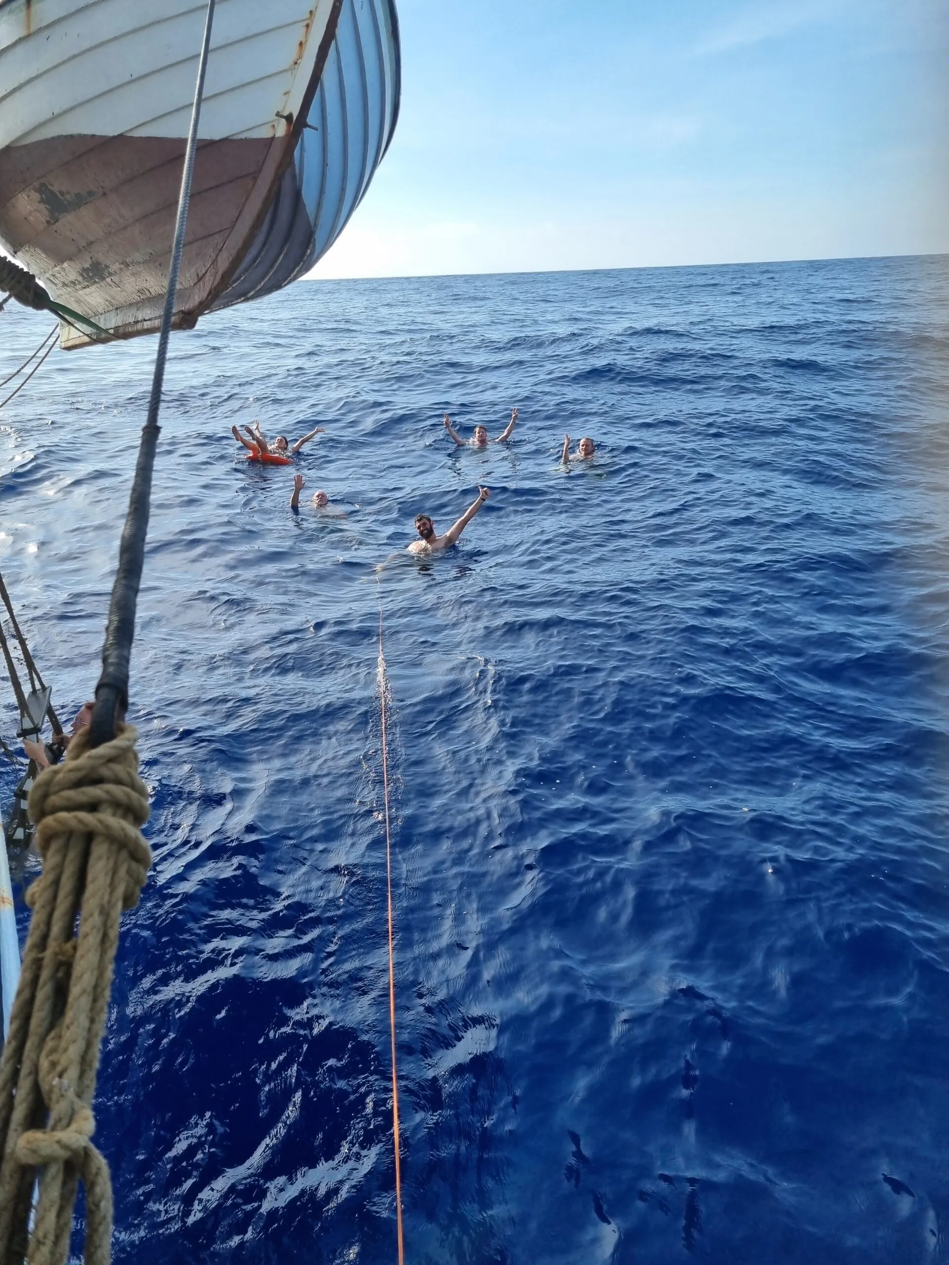 Trainee crew climbing the rigging of NEPTUN to unfurl sails during early training