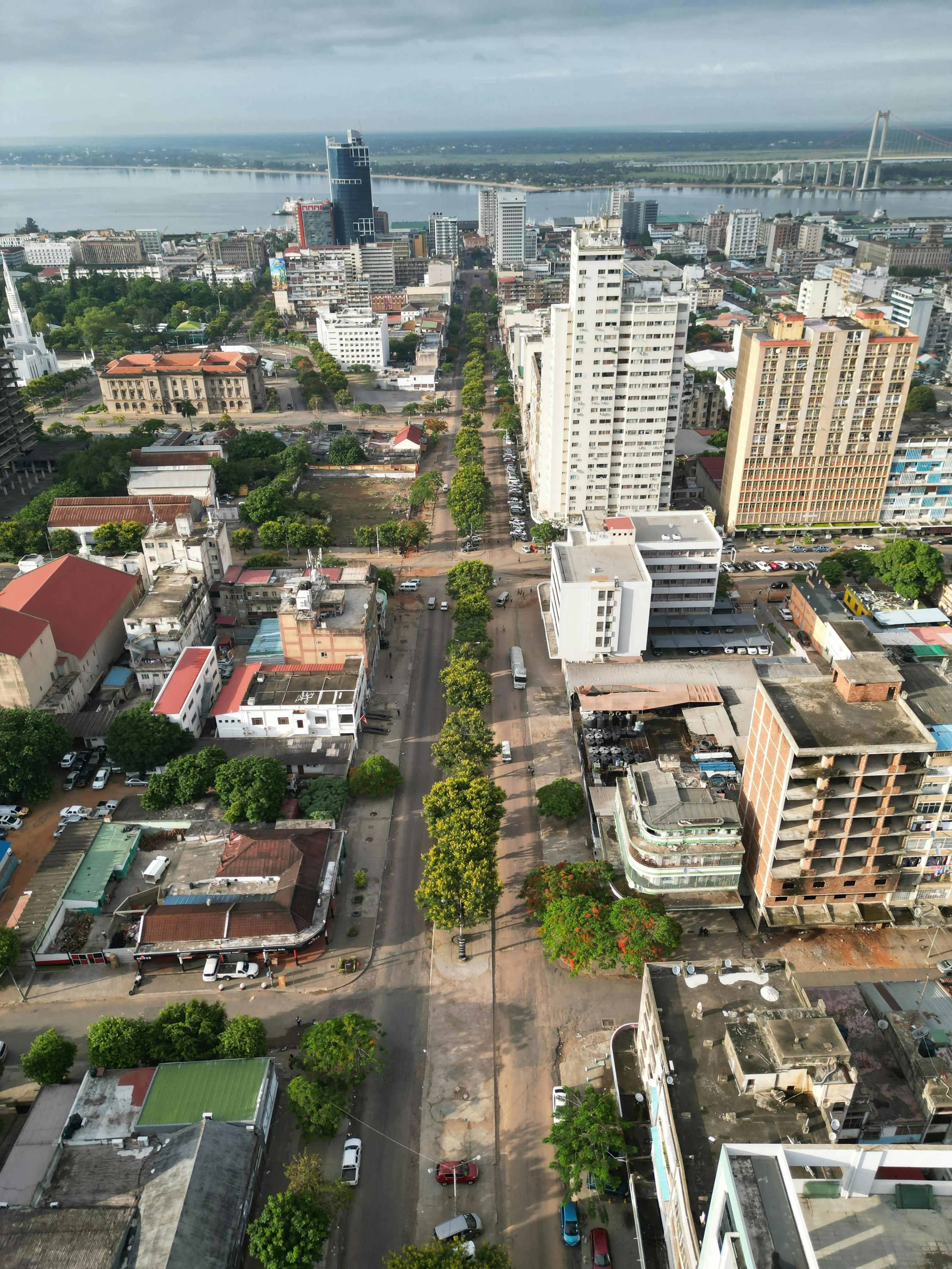 Maputo from the air, Portuguese Africa pressed against the bay.