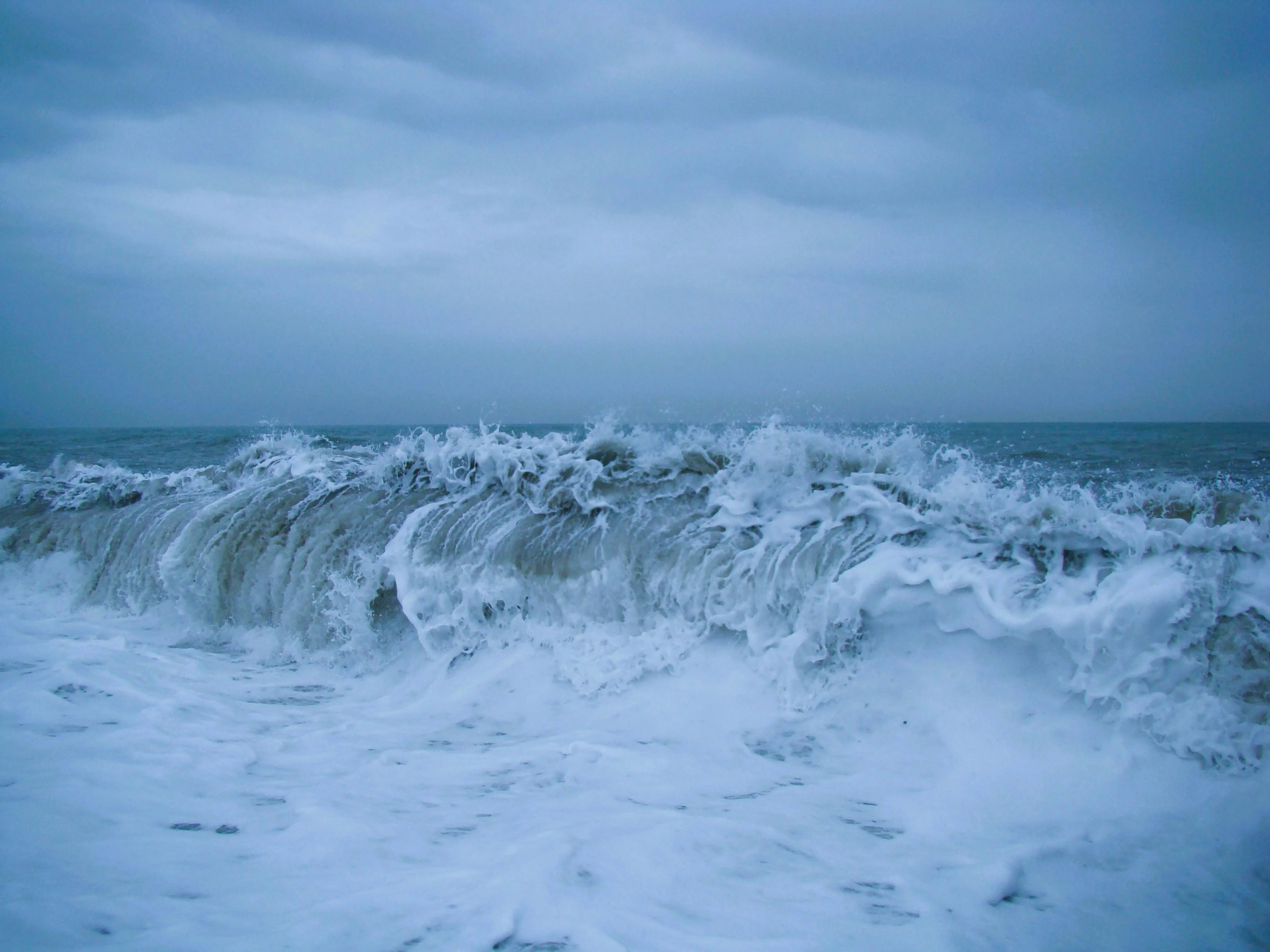 Southwesterly swell building against the Agulhas current, the signature Cape weather collision.