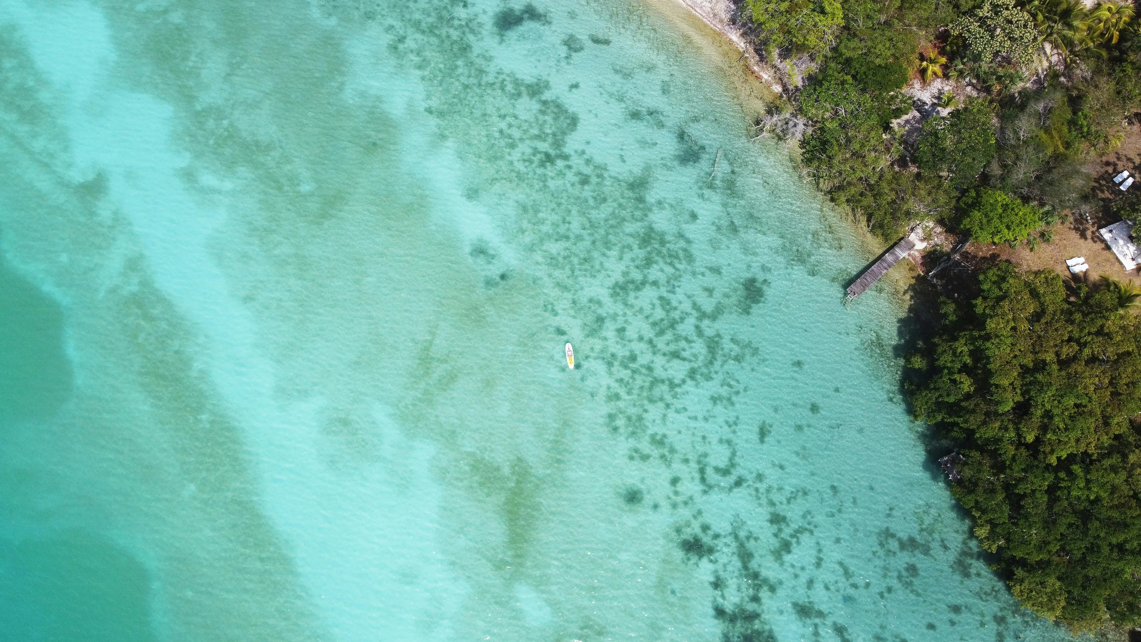 Turquoise reef water, echoing Mayotte's vast enclosed lagoon.