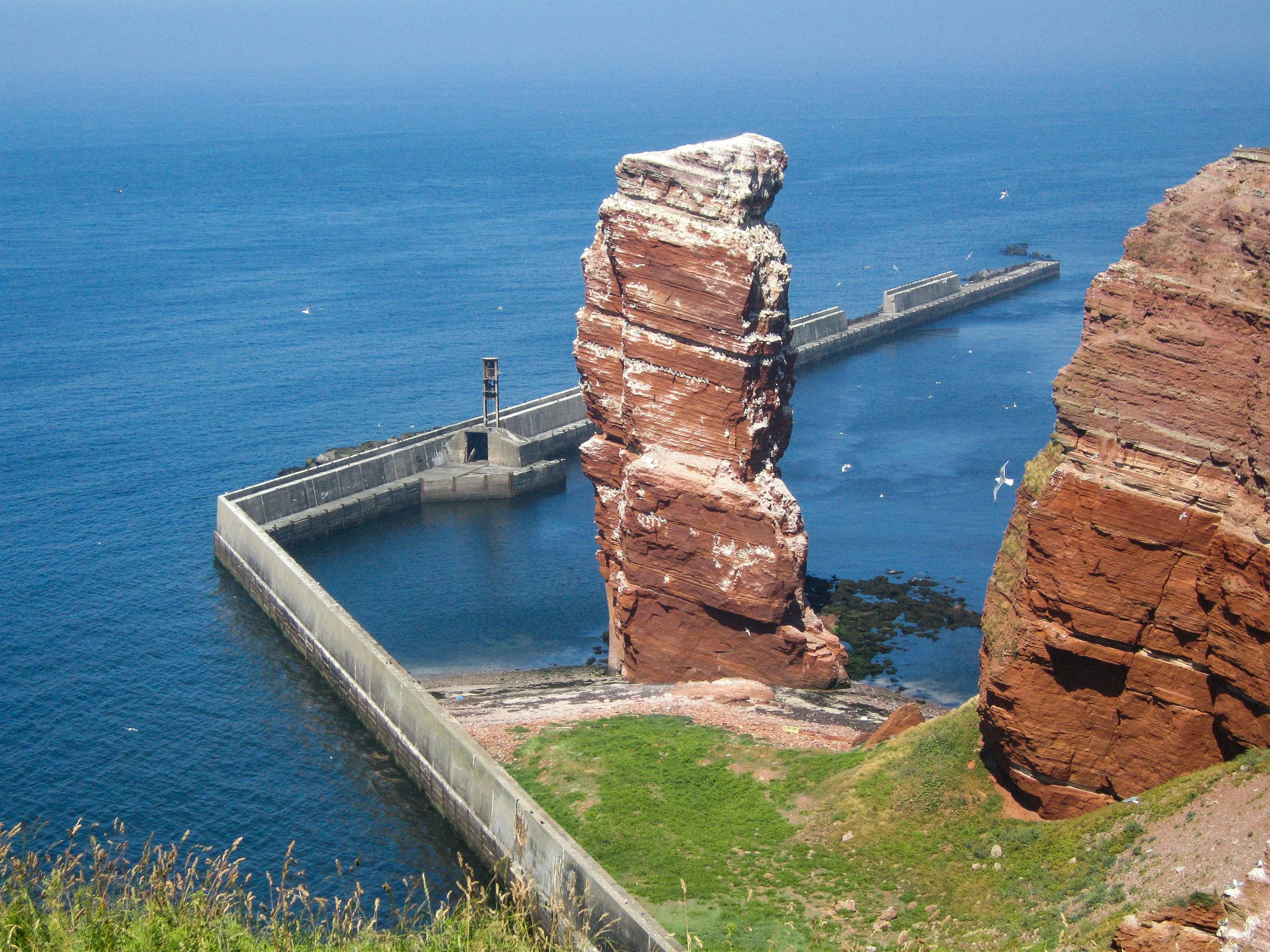 Lange Anna, the isolated sandstone stack off Helgoland, and the walking island's most famous silhouette.